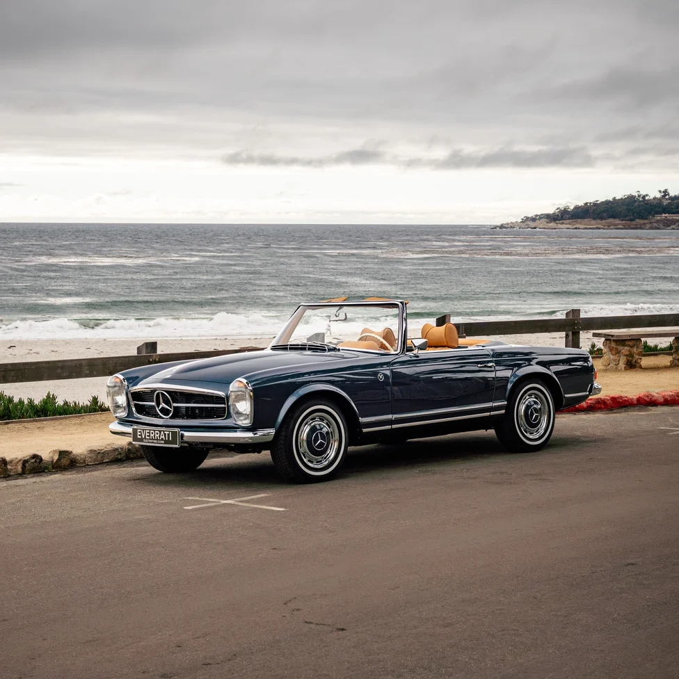 Everrati electric Mercedes-Benz W113 SL Pagoda in concours condition by the beach