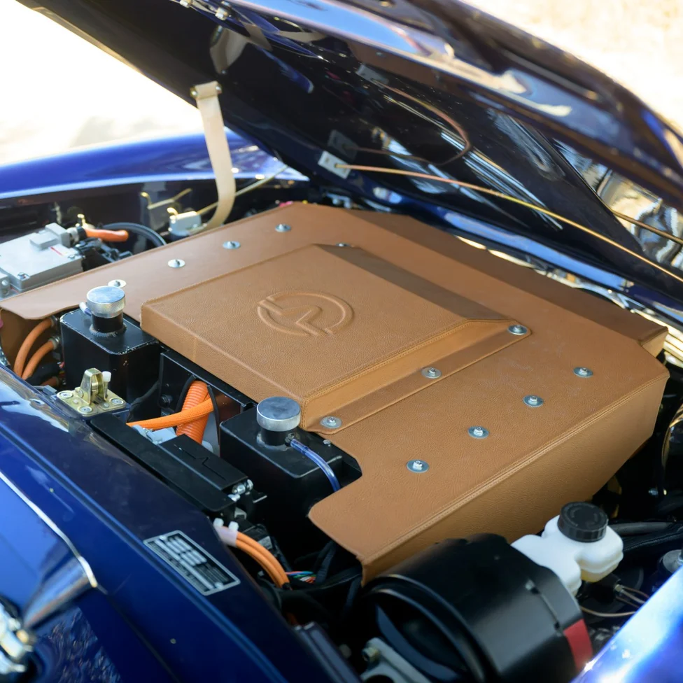 Everrati Mercedes-Benz W113 SL Pagoda electric powertrain under a tan leather cover