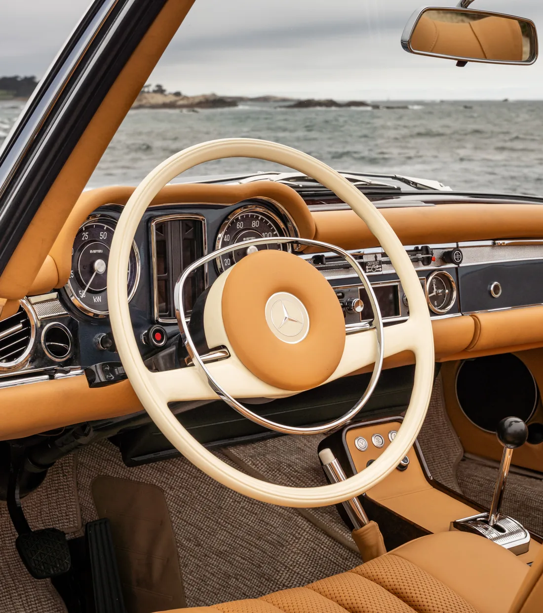Everrati Mercedes-Benz W113 SL Pagoda ivory steering wheel and tan leather dashboard